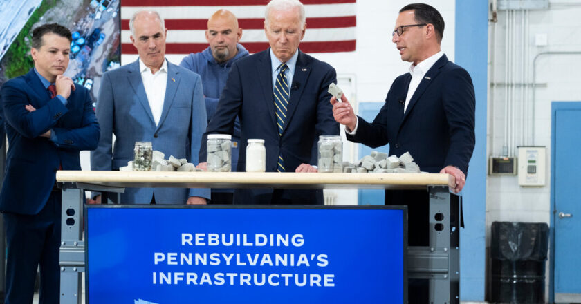 As Trump Battles Charges, Biden Focuses on the Business of Governing