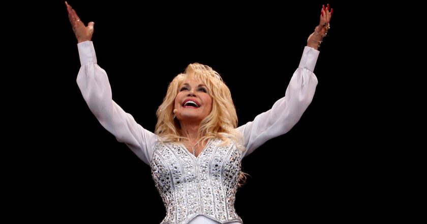 Dolly Parton “Busted a Gut” Reaching for the High Notes on “Rockstar”