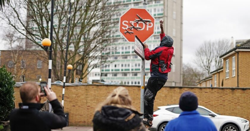 London police investigate alleged theft of Banksy stop sign